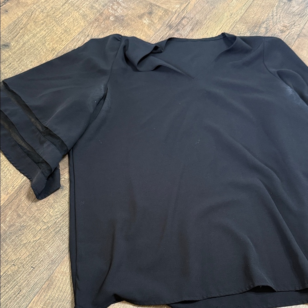 Elegant Black Blouse with Sheer Sleeves